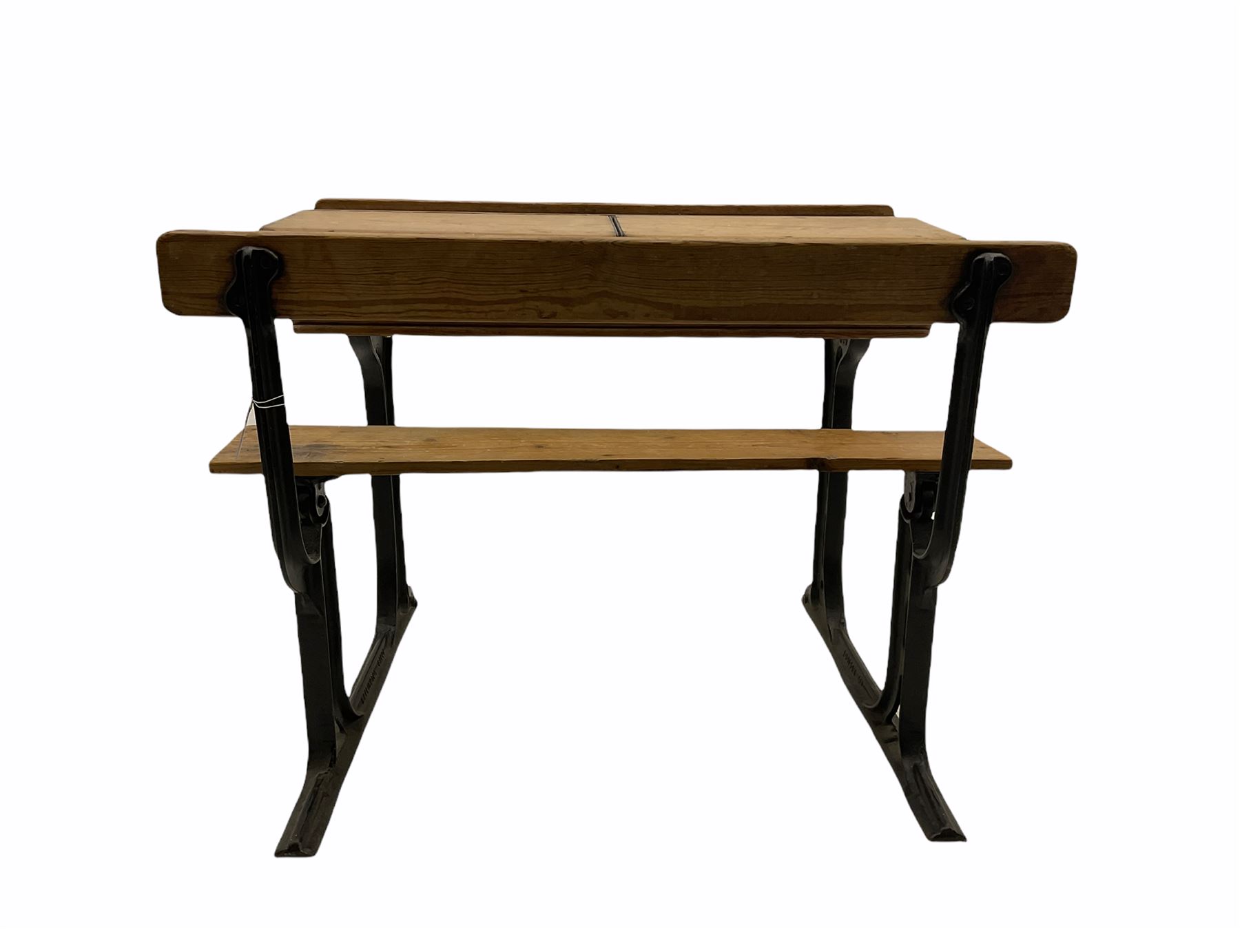 Early 20th century school desk, pine and cast iron, two sectional with hinged lids, the irons marked ‘Addision Ltd.’