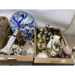 Cast iron pheasant doorstop, two Capodimonte tramp figures, quantity of ceramics to include Delft style , quantity of Warner Bros Carosello decanters etc in three boxes and basket