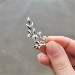 18ct white gold diamond flower brooch, set with a principal old cut diamond of approx 1.00 carat, surrounded by three further old cut diamonds, total diamond weight approx 1.75 carat