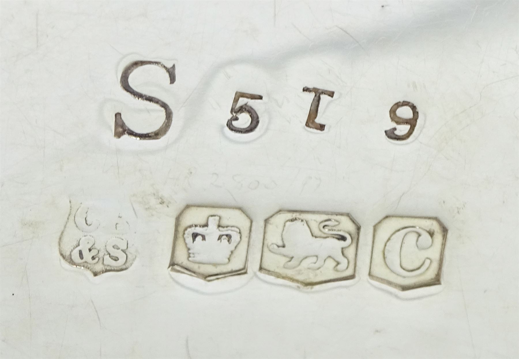 Raich Carter - presentation hallmarked silver two-handled tray of rounded oblong form with gadrooned rim by Wilson & Gill, 139 Regent Street, London, inscribed to the centre 'Presented to Mr. & Mrs. Raich Carter by the Lord Mayor of the City and County of Kingston-upon-Hull Alderman R.E. Smith J.P. on May 30th 1952on behalf of the many Admirers who subscribed to The Lord Mayor's Testimonial Fund in recognition of Raich Carter's genius as a footballer and his services to the City', London 1937 82oz L61cm; together with a hallmarked silver four-piece tea and coffee set by Cooper Bros. & Sons Ltd, the teapot of London shape with ebonised handle and knop, each piece engraved with an initial 'C', Sheffield 1920  60.5oz, teapot L29.5cm