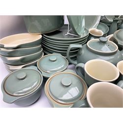Denby Manor Green pattern part tea and dinner service, to include seven dinner plates, thirteen side plates, ten dessert plates, two oval dishes of various sizes, four cups and saucers, seven bowls with covers, two teapots etc (74)  