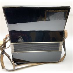 GDR Firotti piano accordion with black and silver case, sixteen keys and forty-eight buttons L38cm; in simulated reptile skin case with sheet music