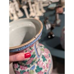 Pair of Chinese Canton famille rose vases, with panels of court terrace scenes surrounded by foliate borders, H35cm 