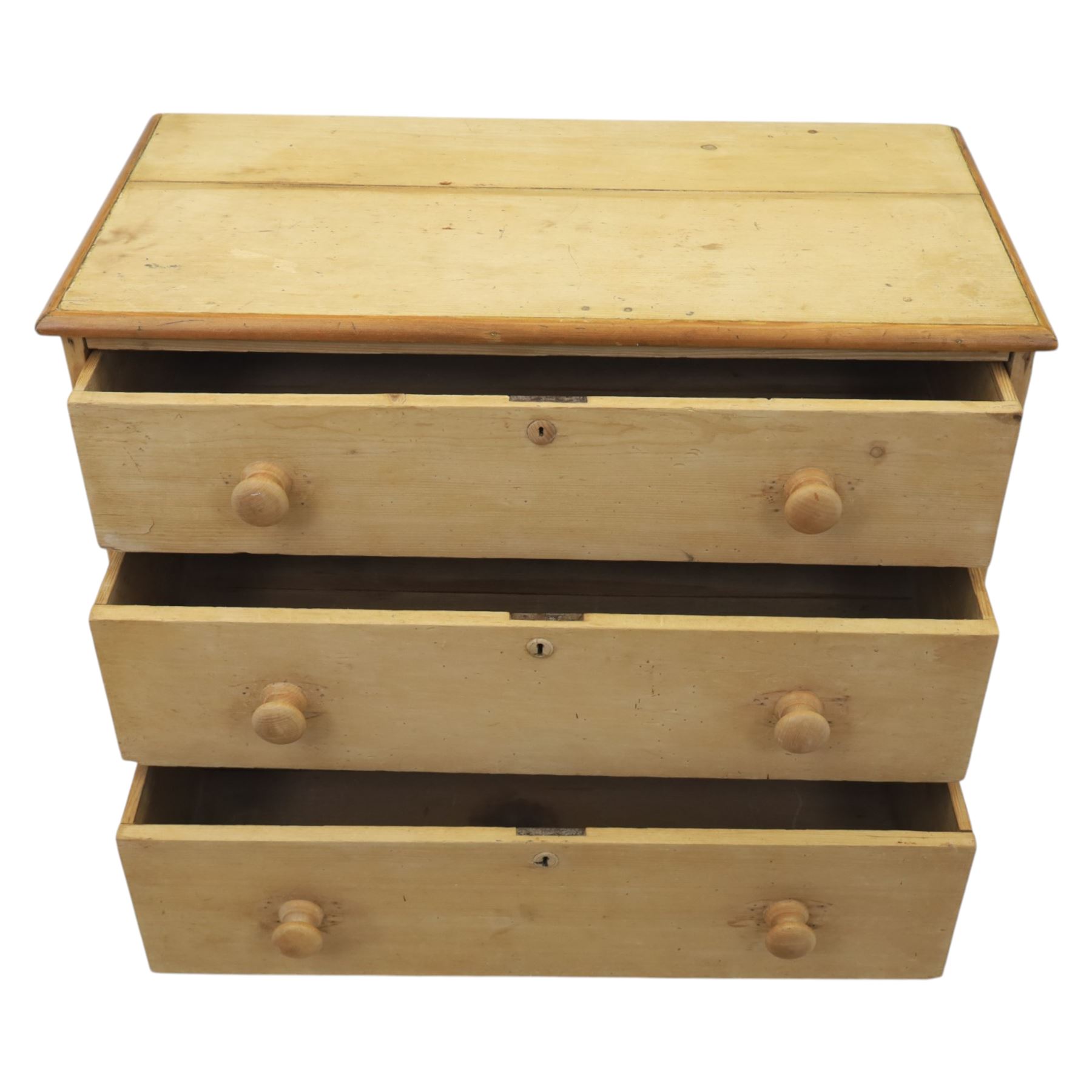 Victorian stripped pine chest, fitted with three drawers, turned wooden handles, raised on turned legs