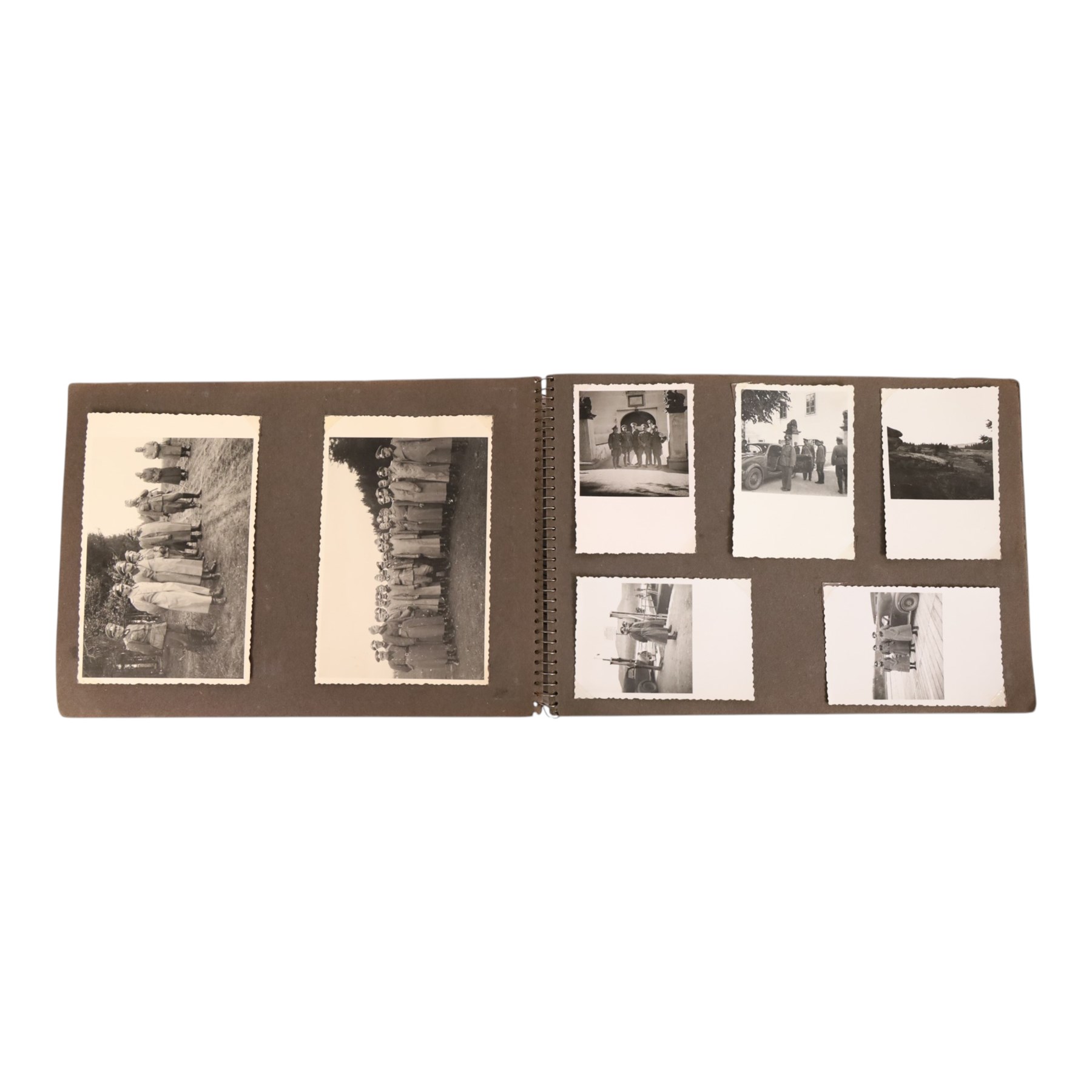 WWII German Soldiers photo album, 1942, including photographs of soldiers in uniform posing during parade etc  
