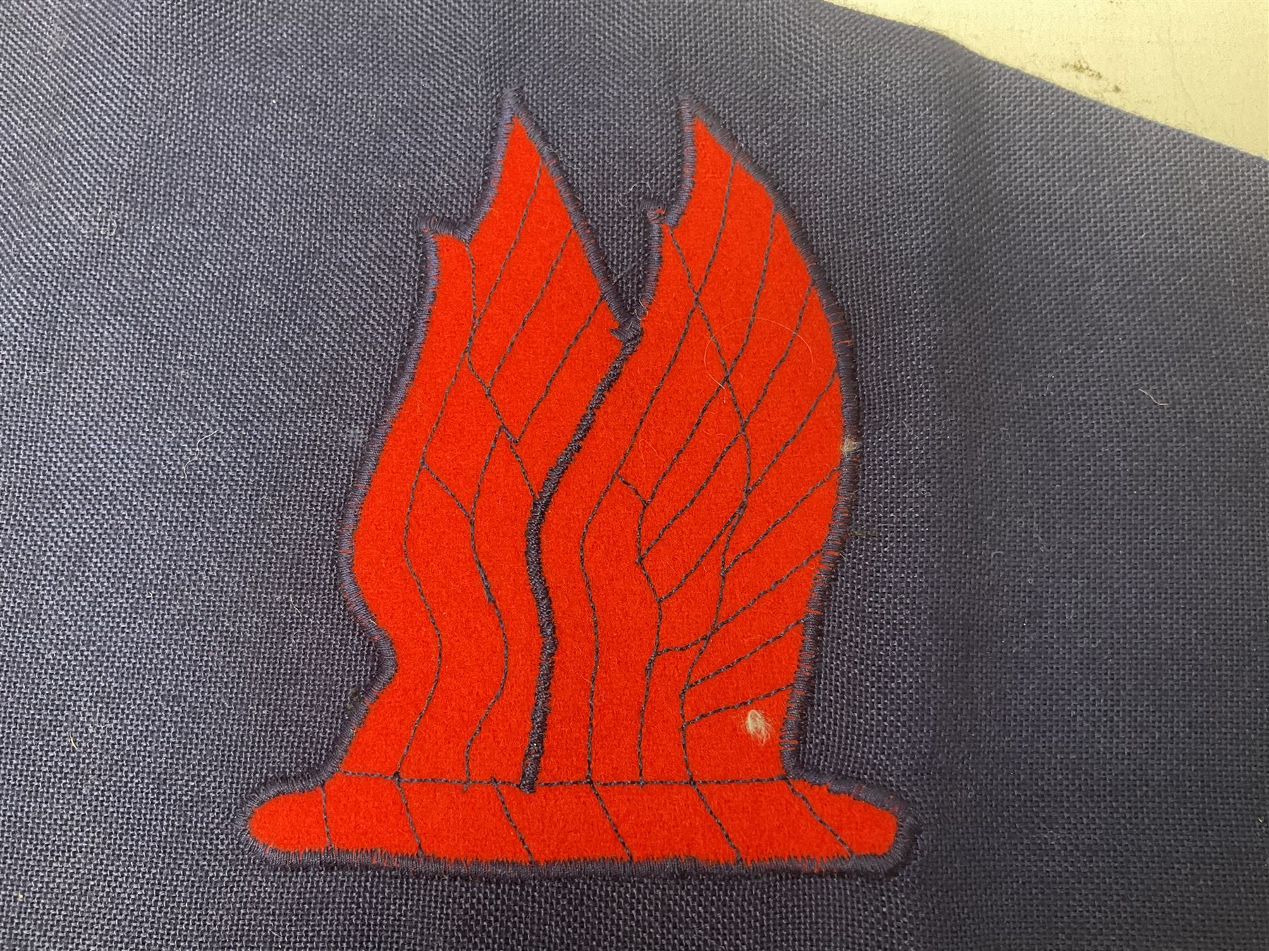 Royal Arms cloth arm adge as worn by Regimental Serjeant-Majors in Foot Guards; naval cap badge; WW2 Commando/Special Forces cloth badges; Home Guard and LDV shoulder titles; and other cloth badges including armoured division, 45th and 77th division, 52nd Lowland Mountain division etc; and 24th Infantry Brigade airmobile pennant