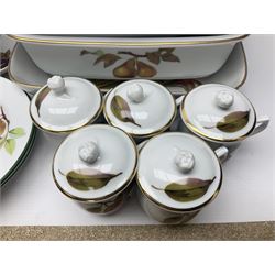 Royal Worcester Evesham pattern, including covered pot de cremes, twin handle tureen, serving dishes, flan dishes, side plates etc  