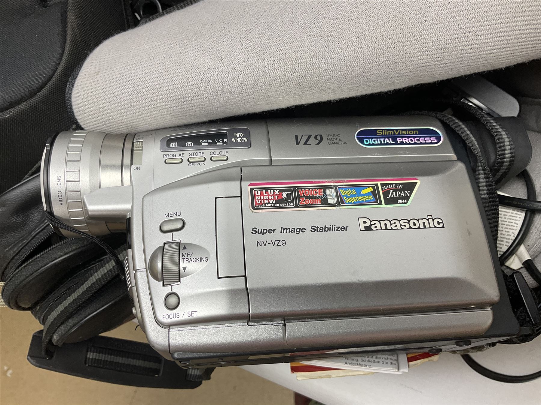 Panasonic NV-VZ9 movie camera, together with Fujifilm Finepix s500, and a large collection of records etc
