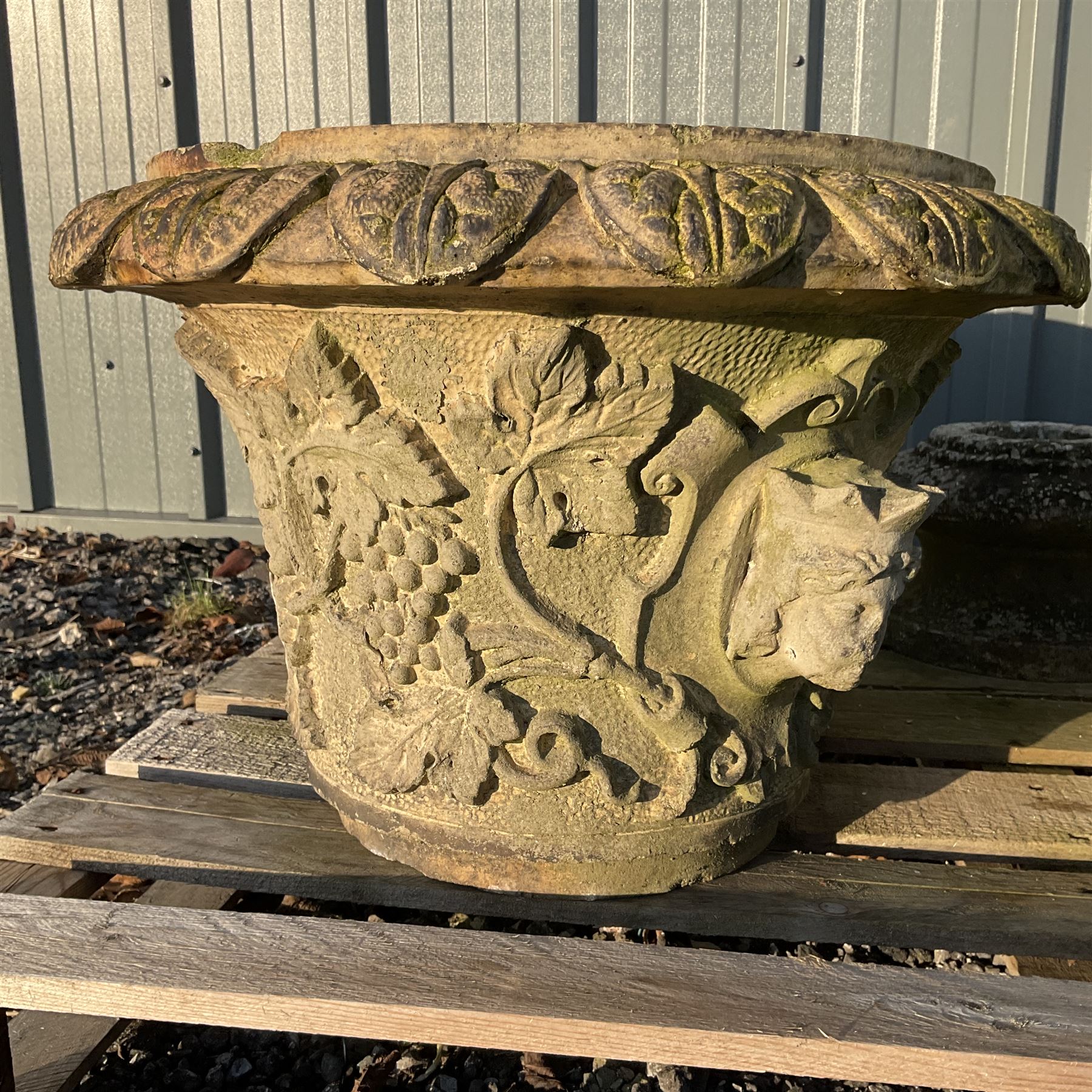 Cast stone animal with two garden urns decorated in grapes and faces with garden urn on plinth  - THIS LOT IS TO BE COLLECTED BY APPOINTMENT FROM DUGGLEBY STORAGE, GREAT HILL, EASTFIELD, SCARBOROUGH, YO11 3TX