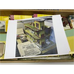 Late 1950s/early 1960s Mettoy tin-plate Emergency Ward 10 hospital set from the TV series, including over twenty figures, over sixty pieces of hospital equipment, beds, chairs, lockers, theatre fittings, stretchers etc; building is complete with movable transparent partitions, operating lift with sliding lift shaft doors and opening windows; wards with fitted swing doors; tin-plate walls with lithographed detail in yellow with red and white tiled effect, cobbled base with ambulance casualties area and lift access; boxed with instructions