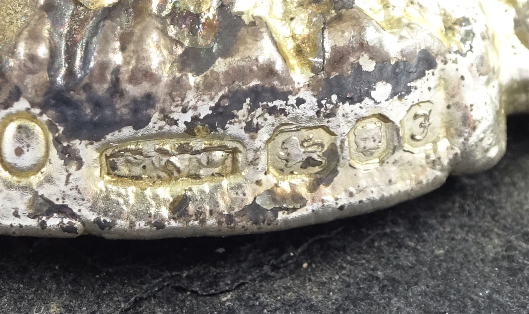 Christopher Nigel Lawrence limited edition silver and parcel gilt surprise mushroom, the textured domed cover opening to reveal two elves decorating a semi-precious gem set Christmas tree, upon a slate base, no 100/250, hallmarked Christopher Nigel Lawrence, London 1980, overall H9cm