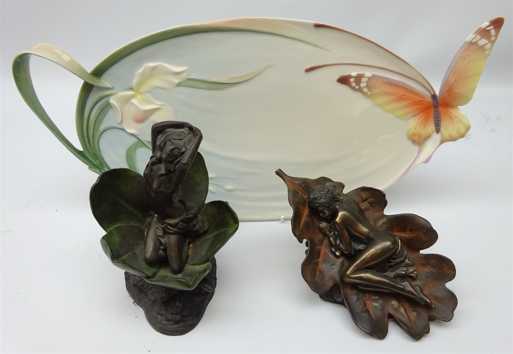 Franz porcelain Butterfly tea tray, L44cm and two Heredities bronzed models 'Spring Awakening
