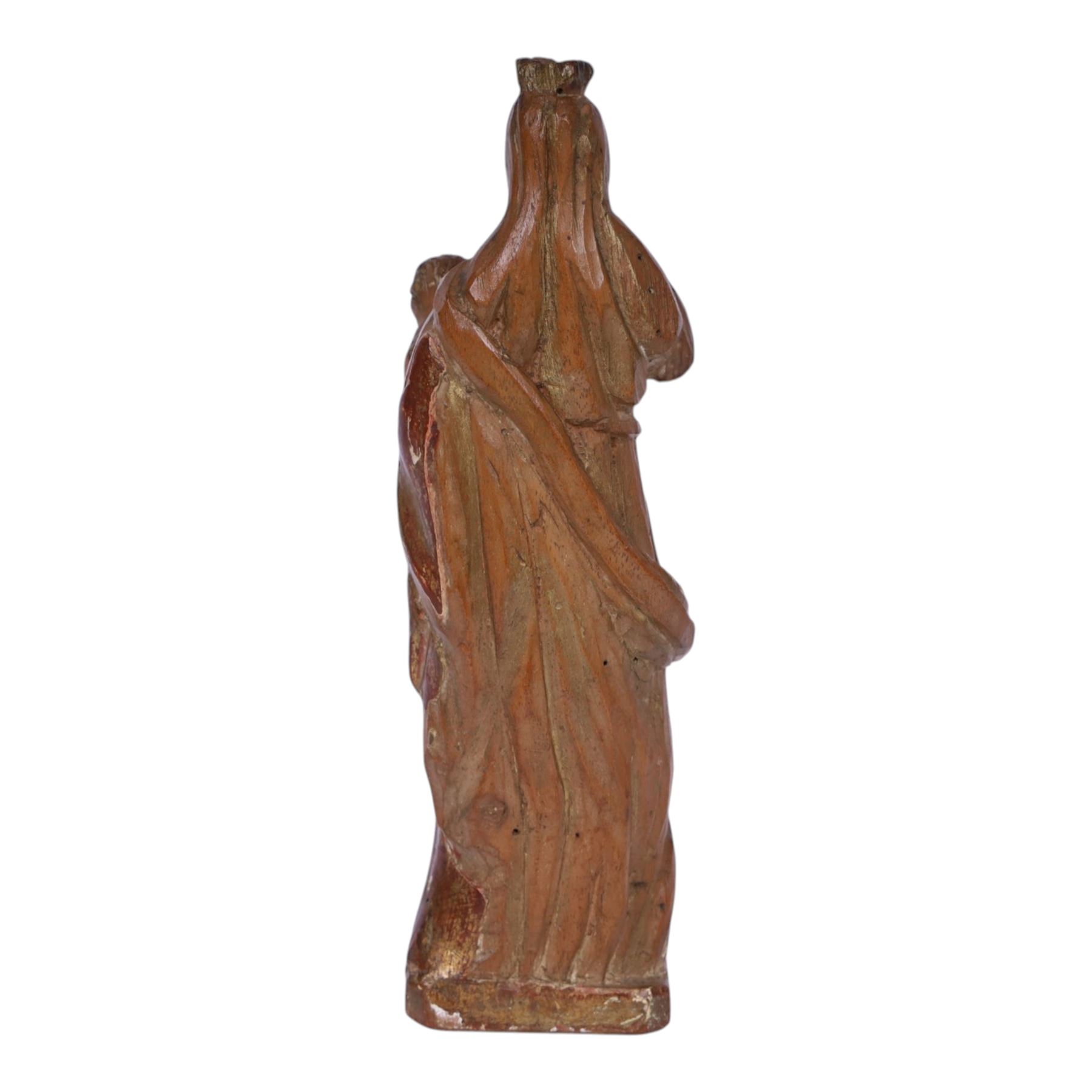 17th century carved limewood figure of a saint, with traces of original gilding, H22.5cm