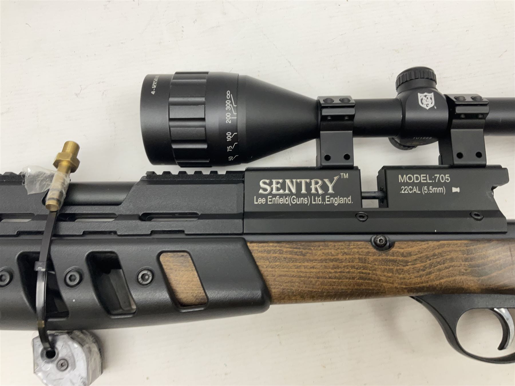 Lee Enfield Sentry Model 705 .22 cal. PCP rifle, with Nikko Stirling Mountmaster 4-12 x 50 scope and wooden stock with pistol grip; serial  no.112117897, L104.5cm overall; in soft carrying case  NB: AGE RESTRICTIONS APPLY TO THE PURCHASE OF AIR WEAPONS.