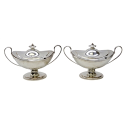  Pair George III old Sheffield plate sauce tureens and covers, boat shape form with urn finials with reeded border and handles, L24cm   