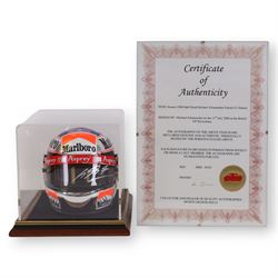 Half-size signed 1996 Michael Schumacher Ferrari helmet, signed at 2004 British Grand Prix, in display case with certificate of authenticity