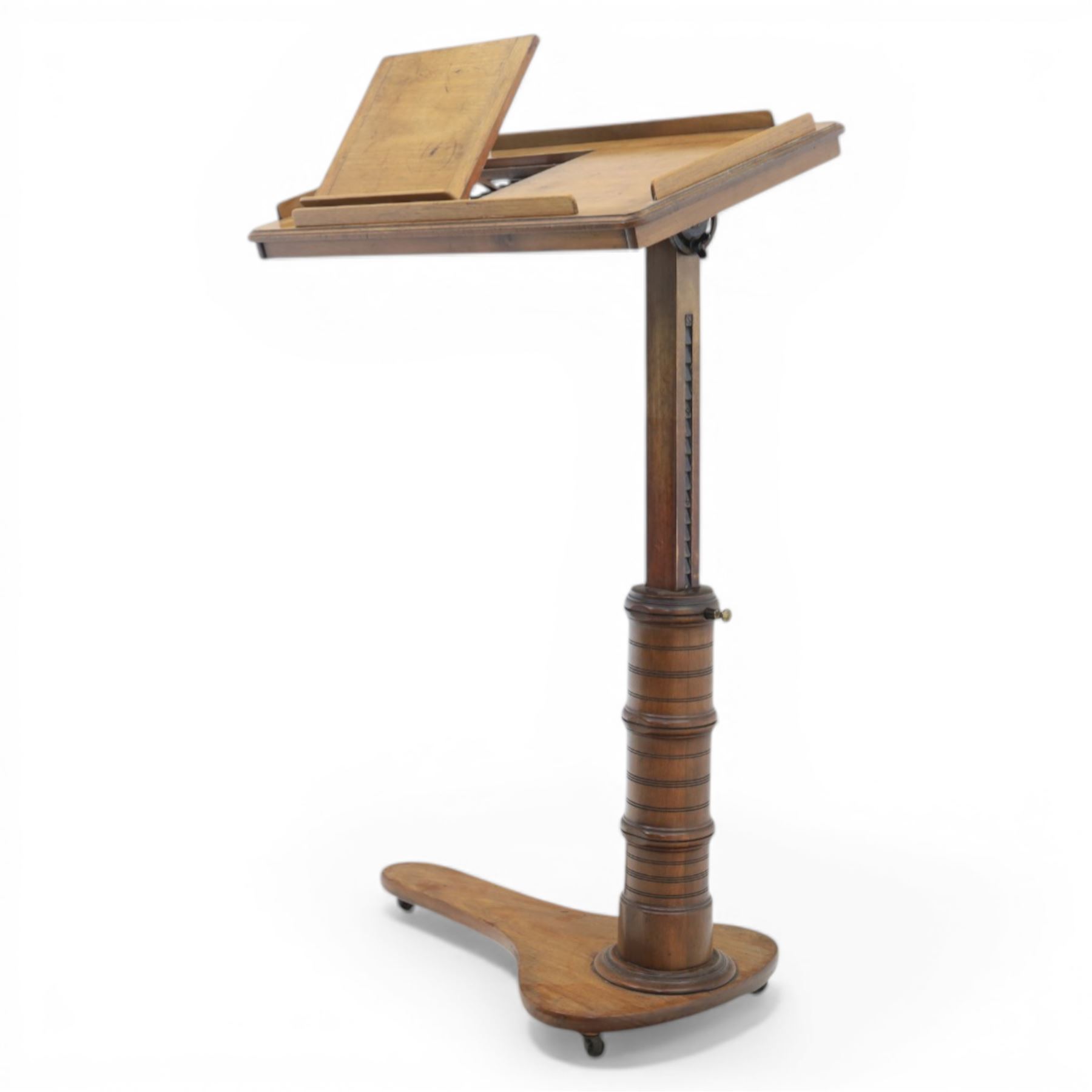 Late Victorian mahogany adjustable reading stand, the rectangular top with moulded and rounded edge and gallery upon a adjustable turned column support, and shaped base