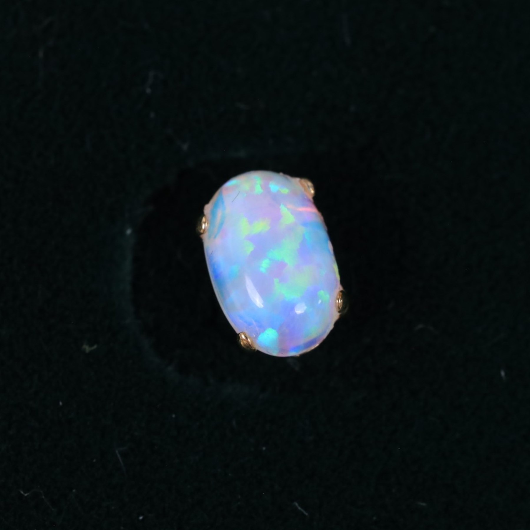 Pair of 9ct gold oval opal stud earrings, boxed