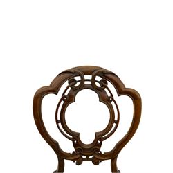 19th century walnut framed chair, shaped pierced back carved with foliage scrolls, the seat upholstered in buttoned floral pattern fabric, on carved cabriole supports