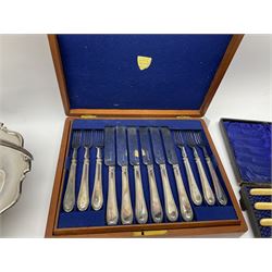 Collection of mostly silver plate, to include tea kettle, naturalistically modelled stand, part fluted teapot, two sauce boats, various cased and loose flatware, including set of fish eaters, ivory handled examples, set of six cased napkin rings, etc.