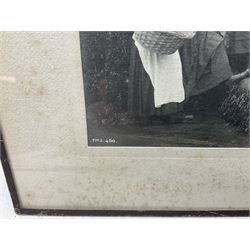 Frank Meadow Sutcliffe (British 1853-1941): Eight Fishergirls at the Foot of Whitby East Pier (E-6C), photograph signed in pencil, initialled and numbered FMS 450 in the image, original  FM Sutcliffe Whitby label verso 14cm x 19cm