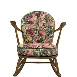 Ercol - beech easy rocking chair, with upholstered loose cushions in floral patterned fabric