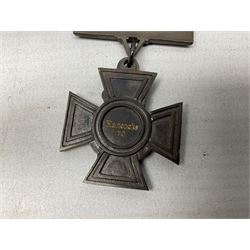 Victoria Cross, an official Hancocks & Co, London replica, the reverse engraved ‘Hancocks 70’, in fitted leather case of issue; Auctioneer's Note: The Victoria Cross was instituted on 29th January 1856, with the first awards backdated to 1854, and in the first 150 years of its existence was awarded on 1,355 occasions (1,352 Crosses and 3 Second Award Bars). To mark the 150th Anniversary, the London jewellers Hancocks, who have manufactured every Victoria Cross ever awarded, issued a limited edition replica, the replicas all individually numbered on the reverse, with the edition limited to 1,352 replica crosses.