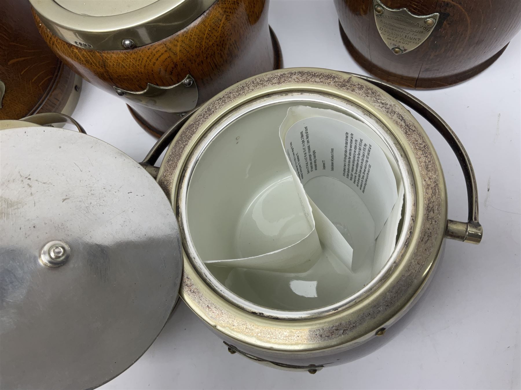 Five early 20th century biscuit barrels with silver-plated mounts, one made from Mahogany from HMS Hindustan