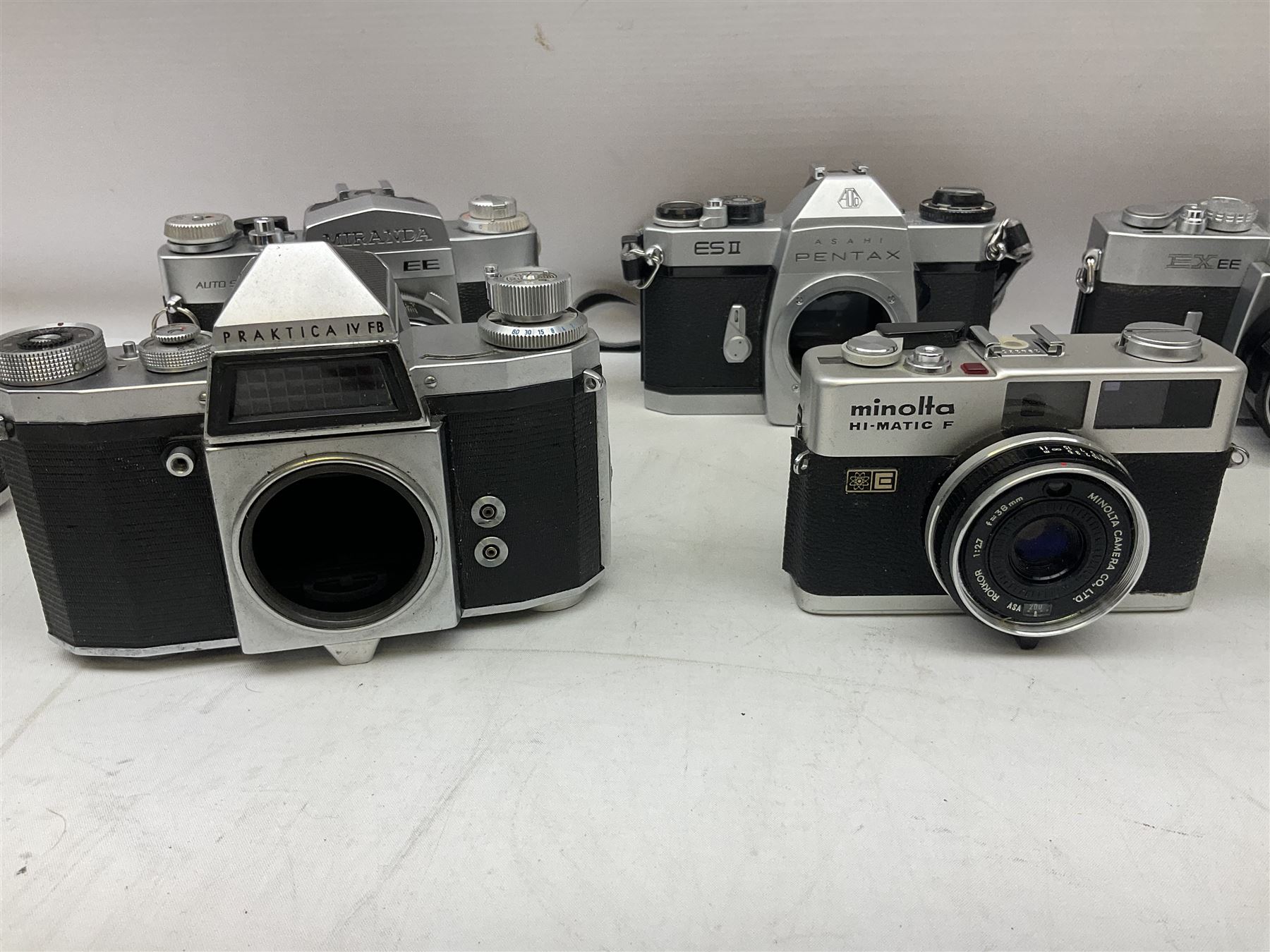 Collection of camera bodies and lenses, to include Contax 159mm, Pentacon FM, Miranda EE, Canon EXee, Praktica IV FB, 'Photax-Paragon 1:5 f=300mm no.312703' lens, 'Sirius MC Automatic 1:2.8 f=28mm, 52 No.934417 etc