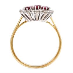 18ct gold ruby and diamond cluster ring, three oval cut rubies surrounded by eighteen single cut diamonds, London 1979, total ruby weight approx 0.55 carat, total diamond weight approx 0.20 carat