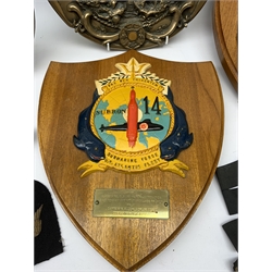  Two Submarine Force US Atlantic Fleet presentation plaques, the first detailed Subron 14, the second USS Abraham Lincoln 602, each H32.5cm, together with five uniform patches, four cap tallies, detailed HSM Tamar (x3), and HMS Ganges, and a set of two limited edition Euro Tunnel commemorative presentation plaques, The Breakthrough 1st December 1990 and Celebration 6th May 1994, D27cm, complete with original certificates.  