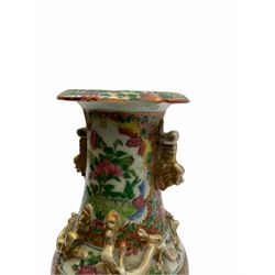 19th century Chinese famille rose vase, the waisted neck and shoulders with applied moulded dragons in gilt, the body decorated with panels of flowers, H25cm