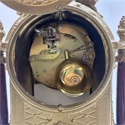 Continental-20th century clock garni in a mid 19th century style case, with porcelain panels and dial, spring driven two train movement with a floating balance escapement, striking the hours and half hours on two bells. With conforming urns. 
