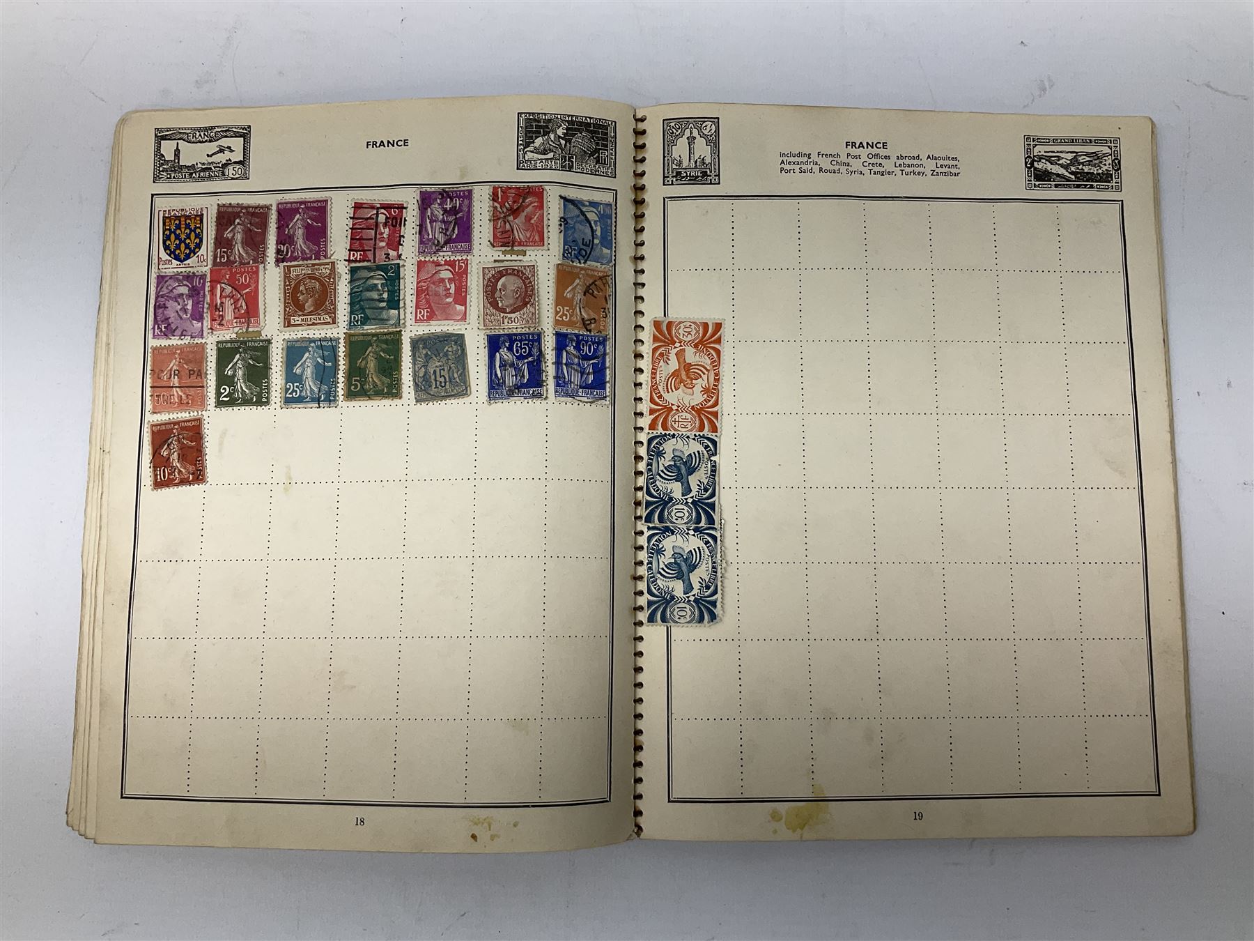 Comic postcards including Bamforth and Quip examples together with WW1 postcards, a collection of world stamps including examples from China, and other ephemera 