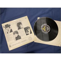 The Beatles vinyl LPs including 'The White Album' no 0260028 with poster', 'Help', 'Rubber Soul', 'Sgt. Peppers Lonely Hearts Club Band', 'A Hard Day's Night' etc (12)