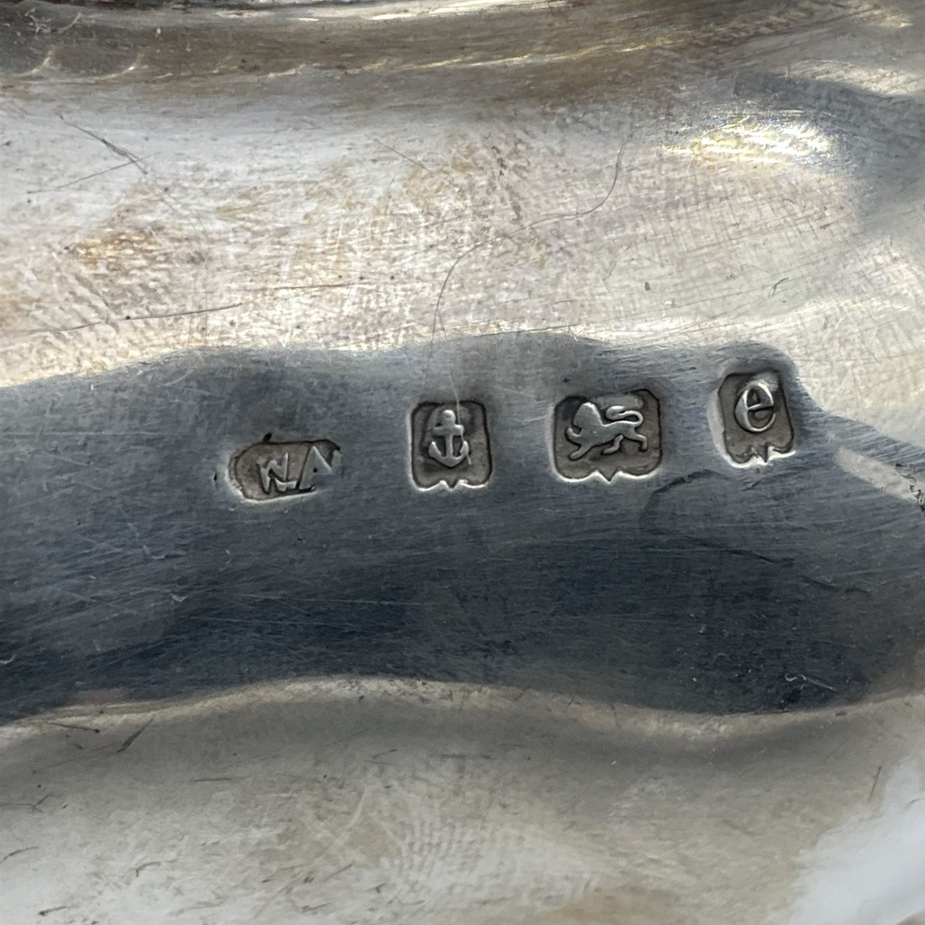 Five piece Edwardian silver tea service, comprising teapot and coffee pot, each with ebonised scroll handle, tea caddy with hinged cover, twin handled open sucrier, and milk jug, each of rounded bombe form, upon four paw feet, hallmarked William Adams Ltd, Birmingham 1904 and 1905, coffee pot H26cm
