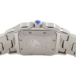 Cartier Santos Galbée gentleman's stainless steel automatic wristwatch, Ref. 2319, silvered guilloche dial with Roman numerals and secret signature at 7 o'clock, boxed purchase certificate dated 2003, pouch and service receipt dated September 2023
