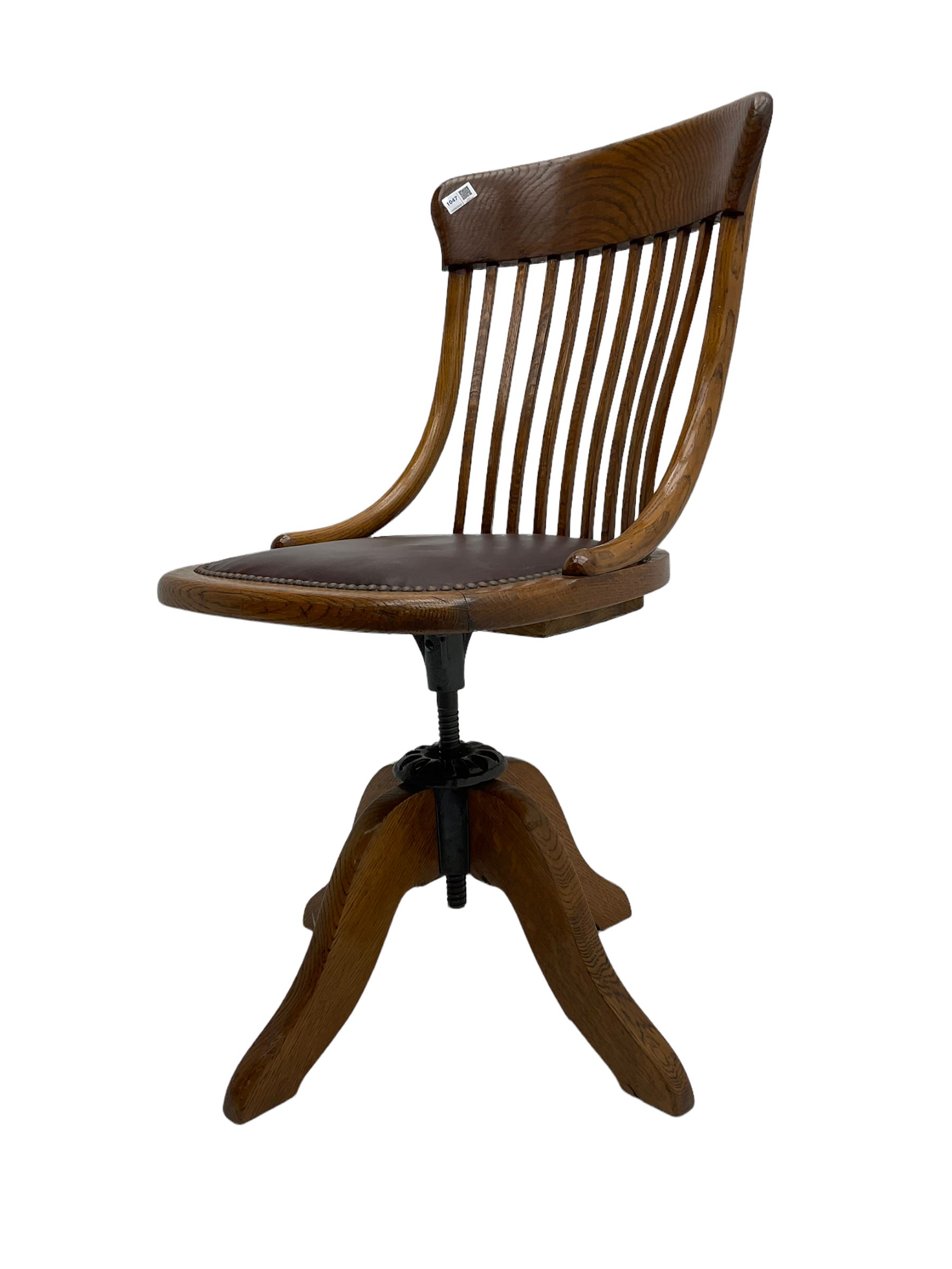 Early 20th century office oak adjustable swivel chair with studded leather seat