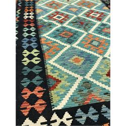 Choli Kilim blue ground rug, geometric patterned repeating border