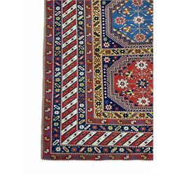 Turkish rug, triple medallion surrounded by geometric motifs and bands