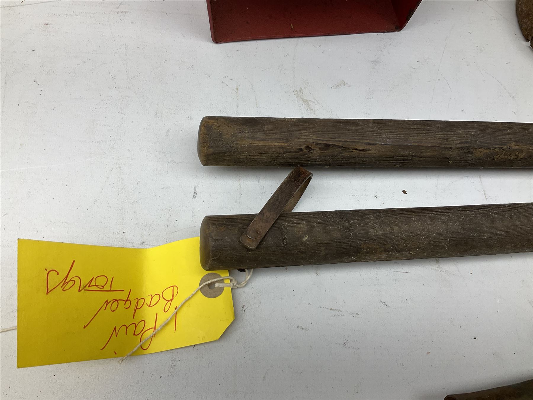 Blue and red painted gas powered bird / pest scarer, bearing label 'Exid bird & pest scarer, imported by C.R.E.A.C.O Hadleigh, Essex', , copper and brass Cymag gas hand pump, three eel spears and a set of badger tongs. Auctioneer's Note: These traps are sold as artefacts for ornamental purposes only as the use of some of them is illegal.