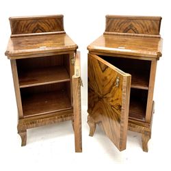 Pair of Art Deco walnut bedside cabinets, raised shaped back above single door,  cabriole legs