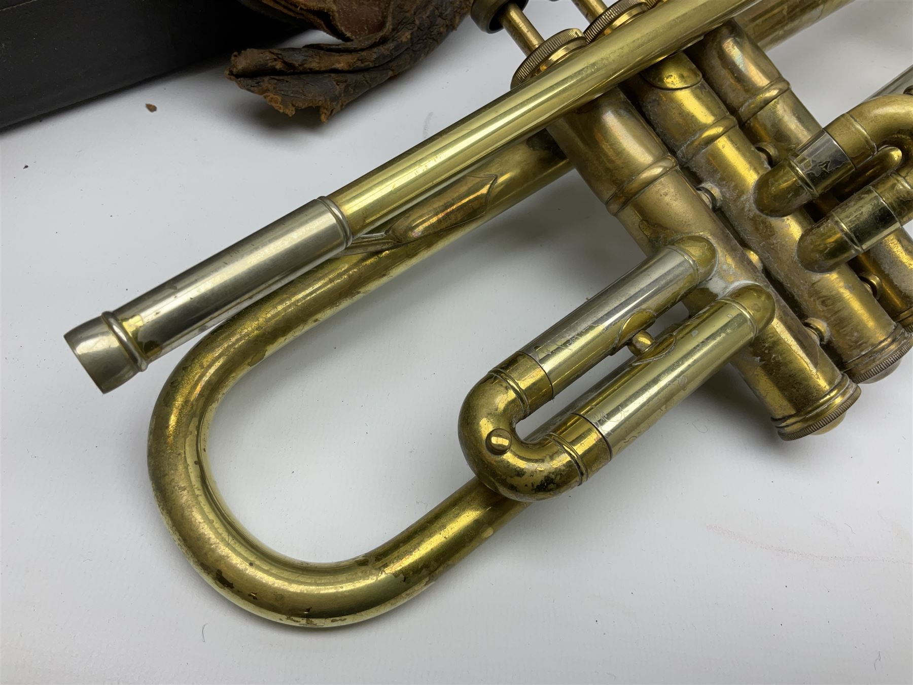 Boosey & Hawkes Emperor brass trumpet L48.5cm; in Henri Selmer carrying case with five mouth pieces and four mutes