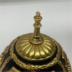 Franklin Mint House of Faberge; The Imperial Jeweled Egg Chess set, the egg opening to reveal a chess board, with a draw to the hexagonal base holding the miniature chess pieces, H23cm 
