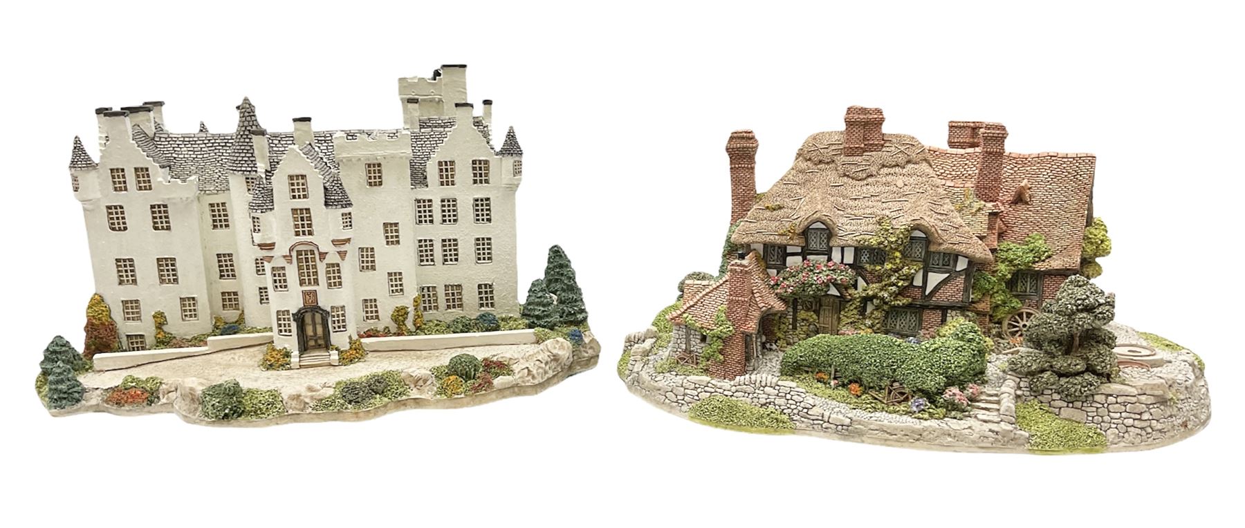 Two limited edition Lilliput Lane cottages, comprising Oakwood Smithy and Blair Athol, both boxed with deeds