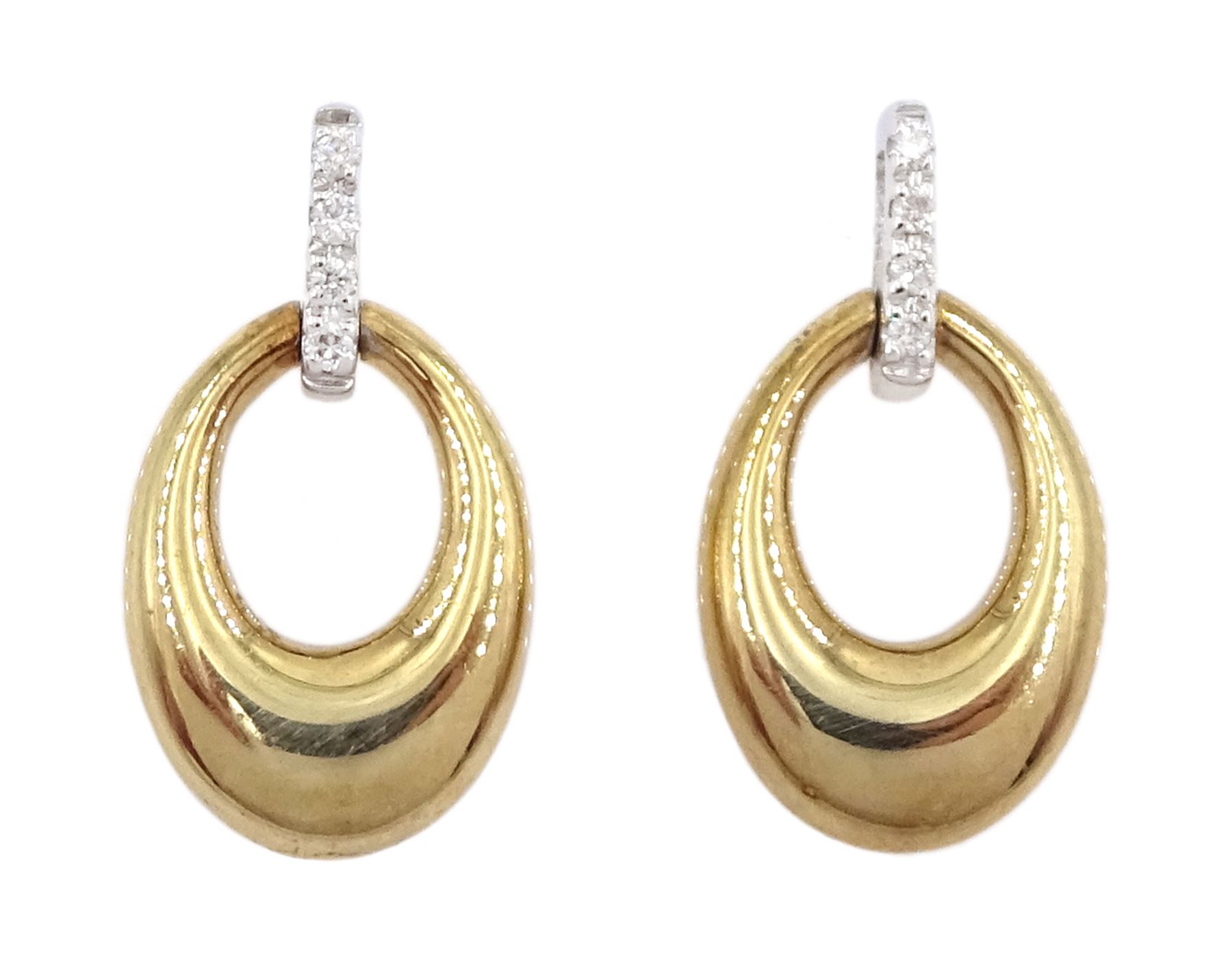 Pair of 9ct white and yellow gold diamond set stud earrings, hallmarked