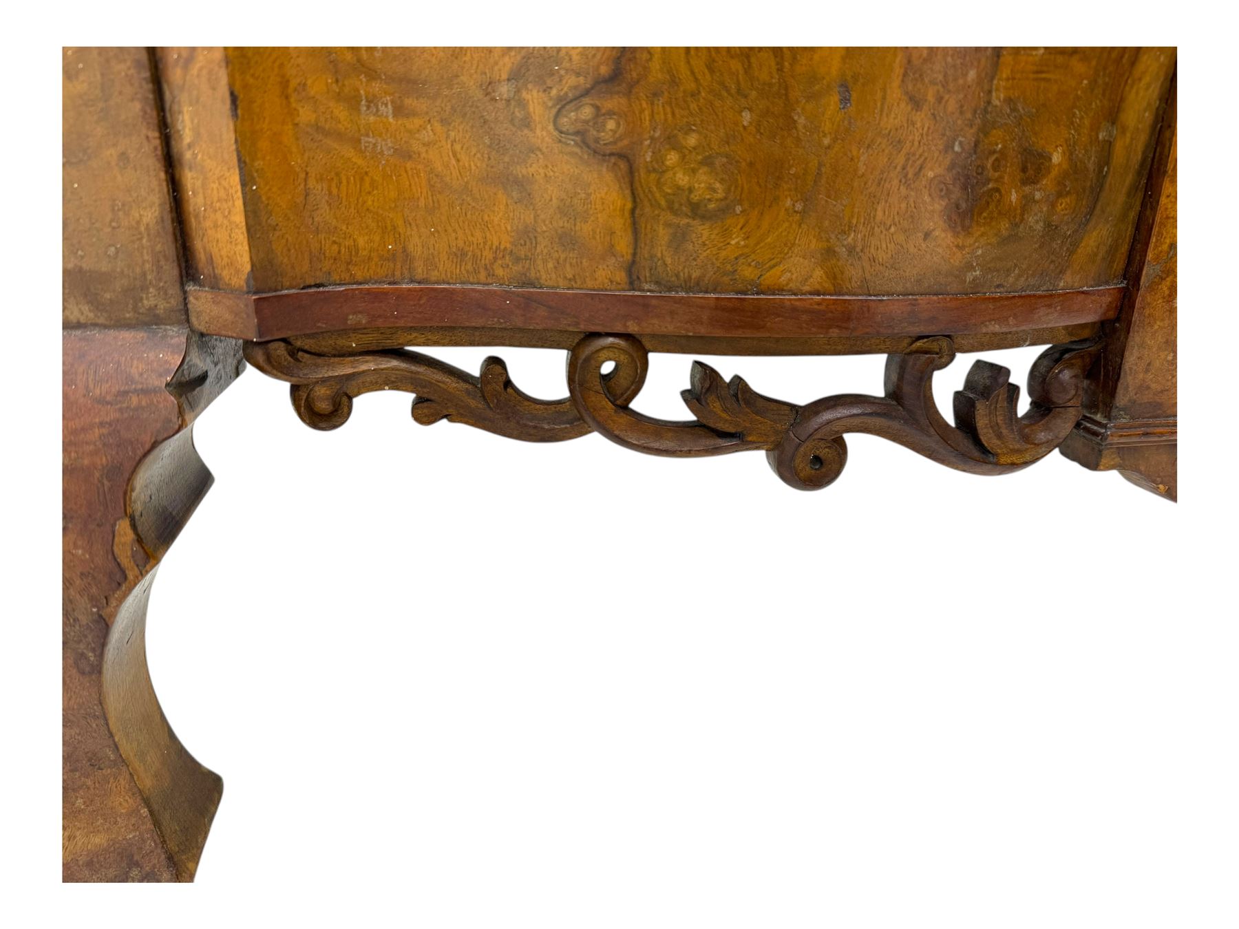 Mid-20th century walnut single bedstead, high shaped headboard, footboard with turned finials and scrollwork carvings, complete with 'Vono' iron frame, raised on cabriole supports