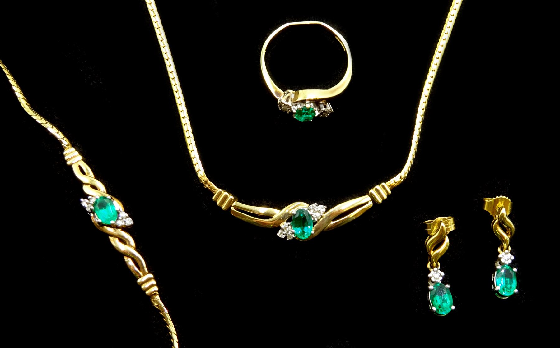 9ct gold diamond and green stone set 