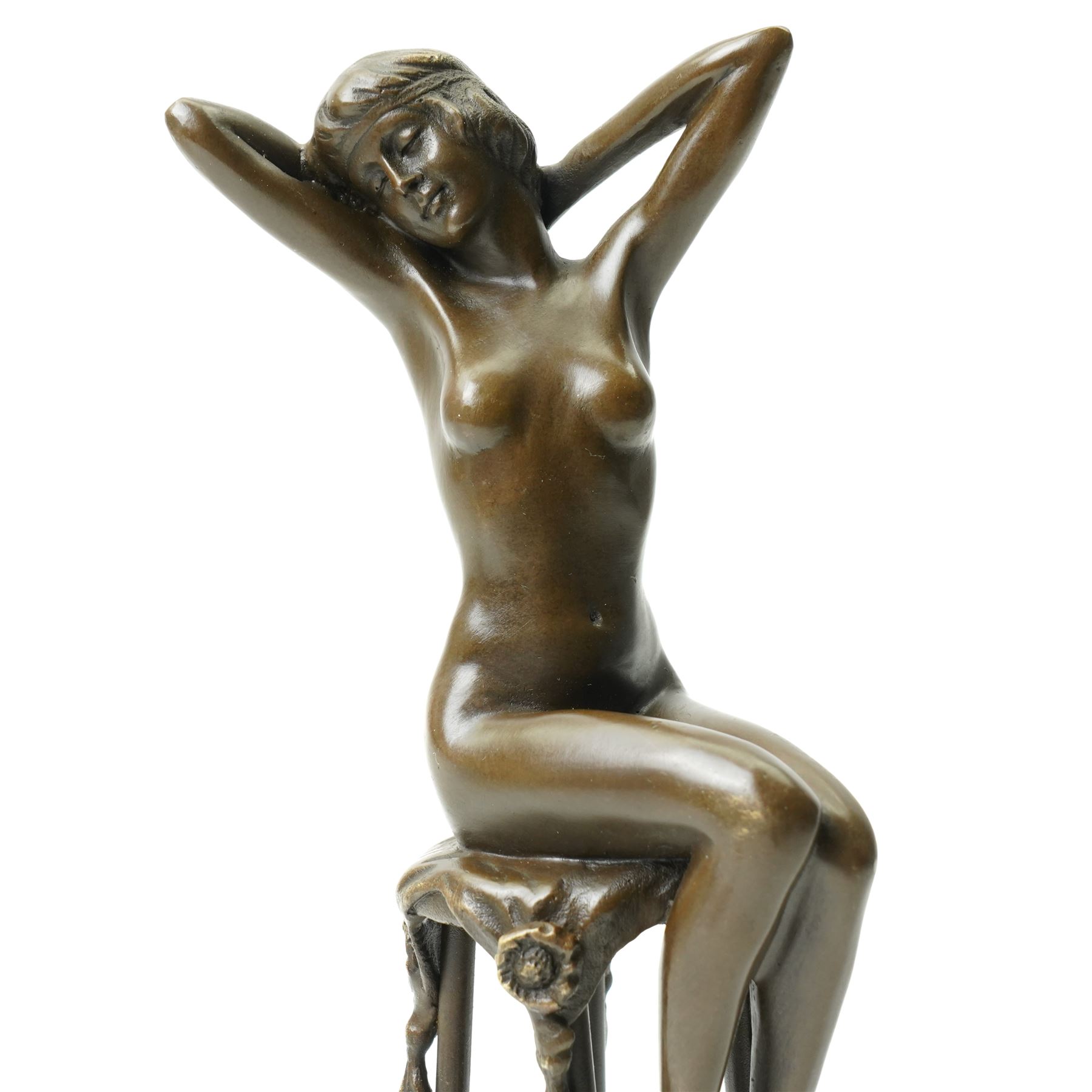 After D H Chiparus, an Art Deco style bronze modelled as a nude female figure seated upon a chair, H28cm.