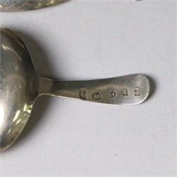 Two George III silver caddy spoons, the first example with oval bowl and flat handle with engraved initial, hallmarked Birmingham 1796, makers mark probably IT, the second with oval bowl, curved handle with shield and initial engraving, hallmarked George Smith III, London 1783